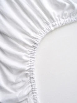 Jersey muotoonommeltu aluslakana valkoinen