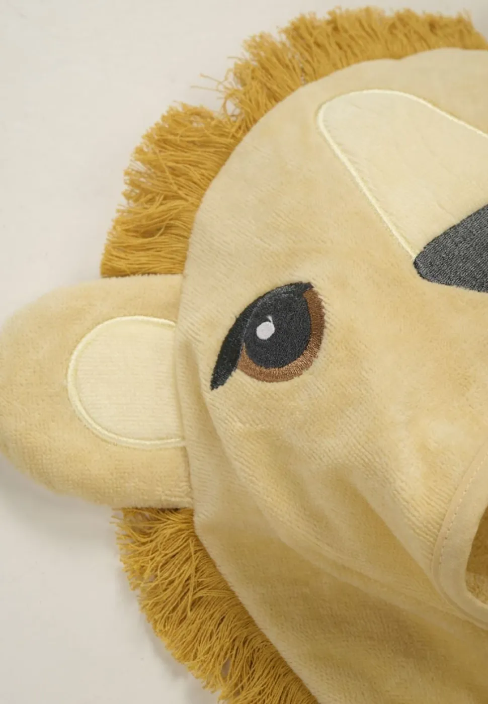 Lion poncho keltainen